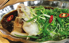 Steamed red tilapia with soy sauce